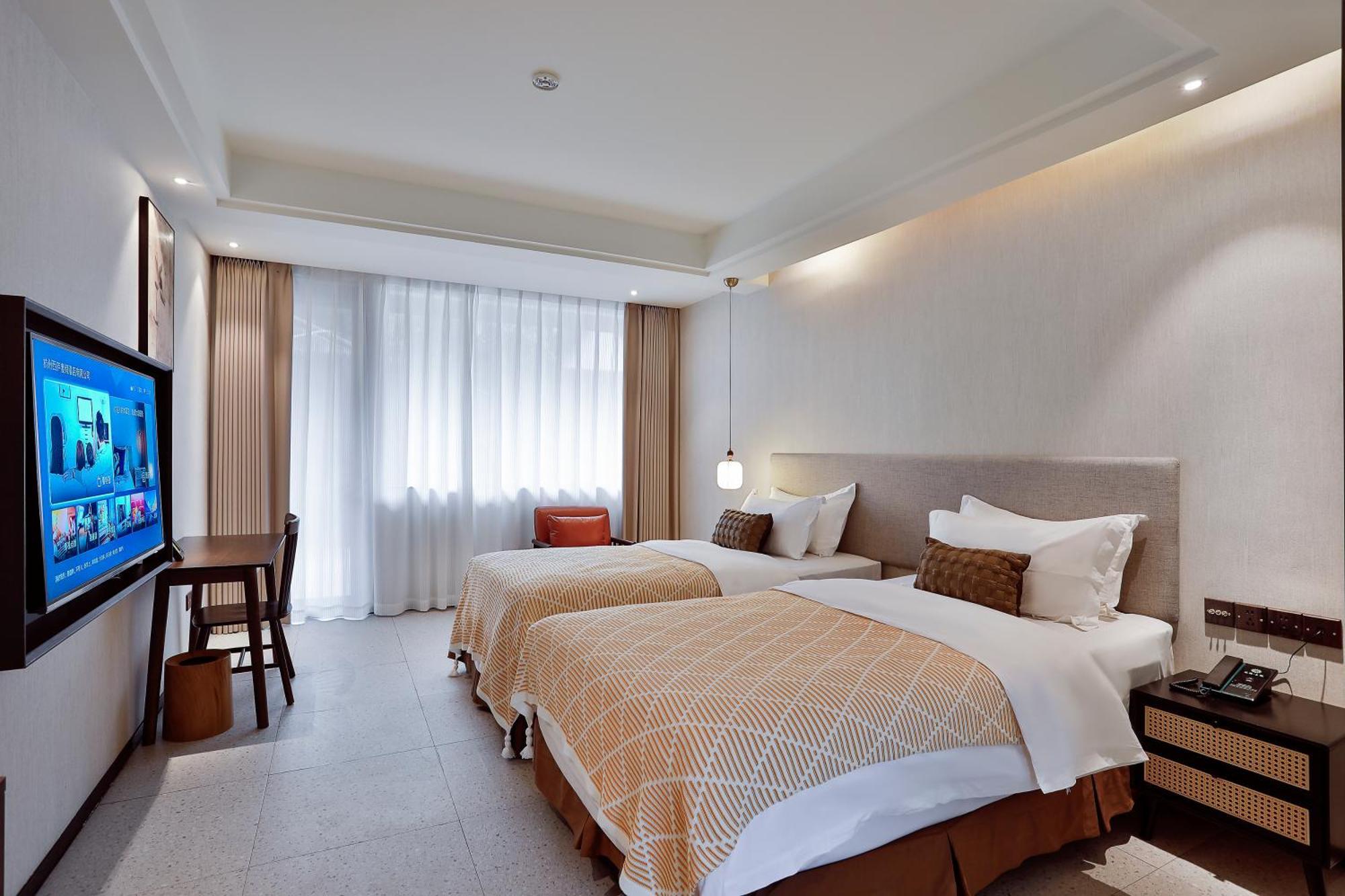 Yurong West Lake Cottage Resort Hotel Hangzhou Esterno foto